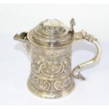 A silver tankard with later applied spout, marks cancelled and LAO case number to side