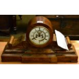 A Victorian walnut cased mantel clock