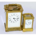 Two brass carriage clocks with keys