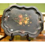 A Victorian papier mache tray painted with floral sprays