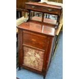 A rosewood music cabinet