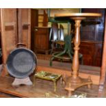 An oak corner cupboard, turned oak circular side table, copper coopered oak coal depot, brass trivet