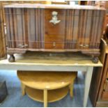 An oak circular coffee table and a reproduction mahogany hinged chest