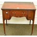 A late 19th century mahogany inlaid games table with folding top incorporating chess board, draughts