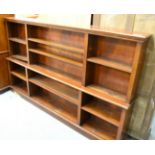 A mahogany adjustable open shelved bookcase