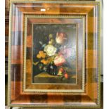 A 17th century style oil still life in a cushion frame, S Toledano (modern) 38cm by 27.5cm. Some