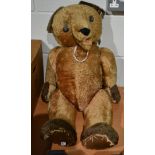 Large straw filled jointed teddy bear with open mouth, 76cm