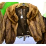 Light brown mink jacket with shawl collar and three quarter length sleeves
