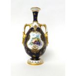 * A Royal Worcester blue ground twin-handled pear shaped vase, painted with fruit by Chivers, 28cm