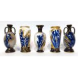 * A pair of Royal Doulton Flow Blue baluster vases, 14.5cm; and a similar vase, 12cm; and a