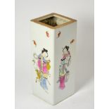 A Chinese porcelain square section vase painted in famille rose enamels with maidens, bears Daoguang