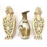 * A pair of Fischer Renaissance style vases, moulded and pierced with masks and scrolls, 38cm high