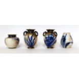 * A pair of Doulton Burslem Flow Blue twin-handled miniature vases, 9cm; and two similar ovoid