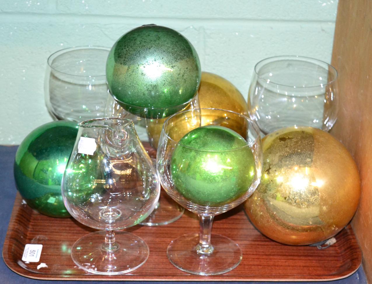 ^ Five glass witches balls; a brandy warmer; and four large wine glasses