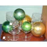 ^ Five glass witches balls; a brandy warmer; and four large wine glasses