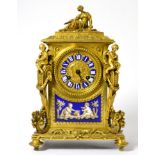 An ormolu and porcelain mounted striking mantel clock, circa 1890, acanthus leaf and scroll borders,