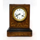 * A rosewood inlaid striking mantel clock, 19th century, carrying handle, enamel dial with Roman