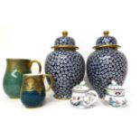 * A pair of Royal Worcester custard cups and covers with chinoiserie decoration; a similar powder