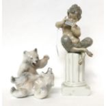 * A Lladro figure of Pan sitting on a column, 28cm; and a Royal Copenhagen group of two bears, 14cm