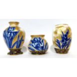 * A Royal Doulton Flow Blue ovoid vase, 18cm; a similar vase, 16cm; and a smaller vase, 11cm (3)