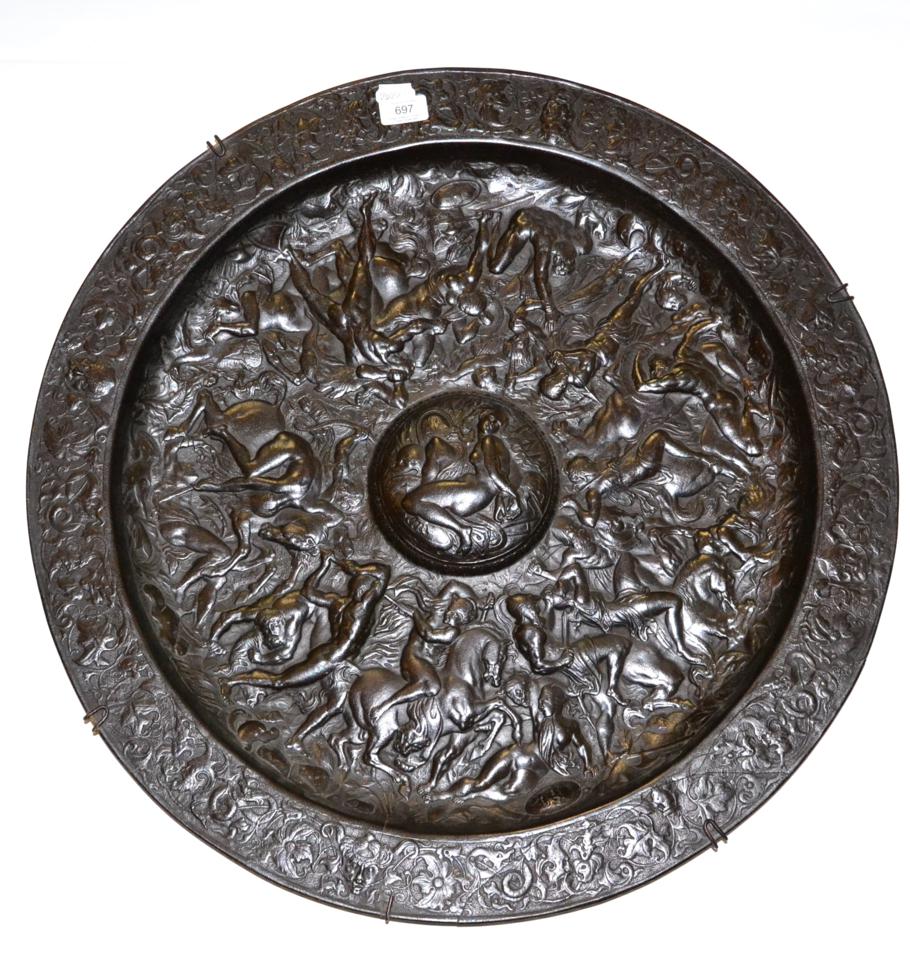 A 19th century circular bronze plaque, relief decorated with classical figures, diameter 66cm (