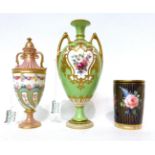 * A Royal Crown Derby green ground urn shaped vase painted with flowers, 20.5cm; a similar pink