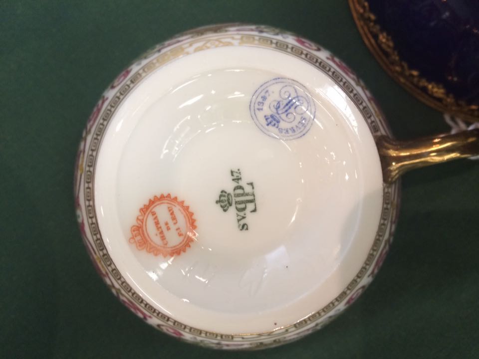 * A Meissen style twin-handled chocolate cup and trembleuse saucer painted with figures in - Image 4 of 6