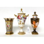 * A Royal Crown Derby twin-handled urn shaped vase and cover, painted by Gresley with flower sprays,