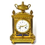 An ormolu striking mantel clock, signed Roque, a Paris, early 19th Century, urn and pineapple