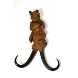 A Blackforest fox coat hook, with antler horn branches