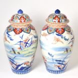 Pair of Japanese Imari vases and covers, circa 1890, 34cm high