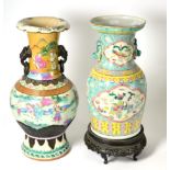 A 19th century Chinese turquoise ground baluster vase painted with precious objects, 36cm high,