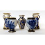 * A pair of Royal Doulton Flow Blue twin-handled vases, 13.5cm; a similar pair of ovoid vases, 9.