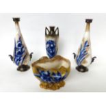 * A pair of Royal Doulton Flow Blue twin-handled baluster vases, 28cm; a similar vase, 24cm; and a