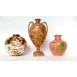 * A Royal Crown Derby pink ground urn shaped vase with gilt decoration, 24cm high; a similar smaller