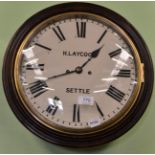 A striking wall clock, H.Laycock settle, back box with a bottom door, 12-1/2-inch painted dial