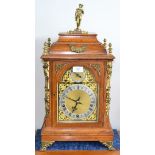 An oak chiming table clock, circa 1890, caddied top, gilt metal mounts, side sound frets and