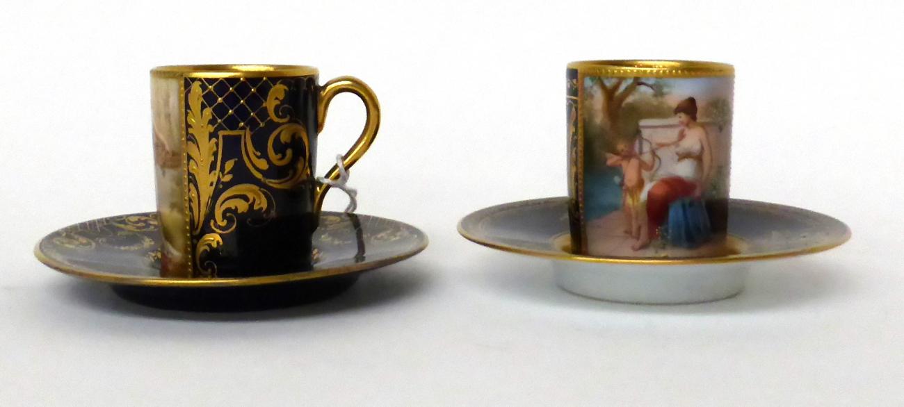 * A Vienna style porcelain blue ground cabinet cup and saucer painted with classical figures; and