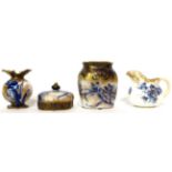 * A Doulton Burslem Flow Blue ovoid vase, 11cm; a similar smaller vase, 9cm; a similar cream jug,