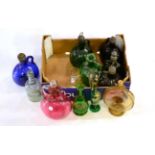 # Five 19th century coloured glass decanters, cranberry glass decanter, an amber tinted decanter,
