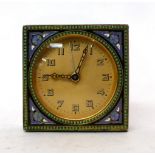* A champleve enamel alarm timepiece, circa 1920, multi coloured champleve enamel panels, gilt