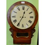 An oak drop dial striking wall clock, circa 1880, side and bottom doors, trunk with a pendulum