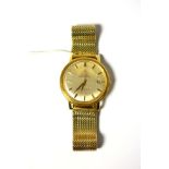 An 18ct gold automatic calendar centre seconds wristwatch, signed Omega, Chronometer, Officially