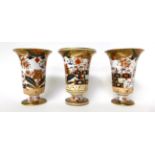 * A pair of early 19th century Spode Japan pattern trumpet vases, 16cm; and a similar vase with