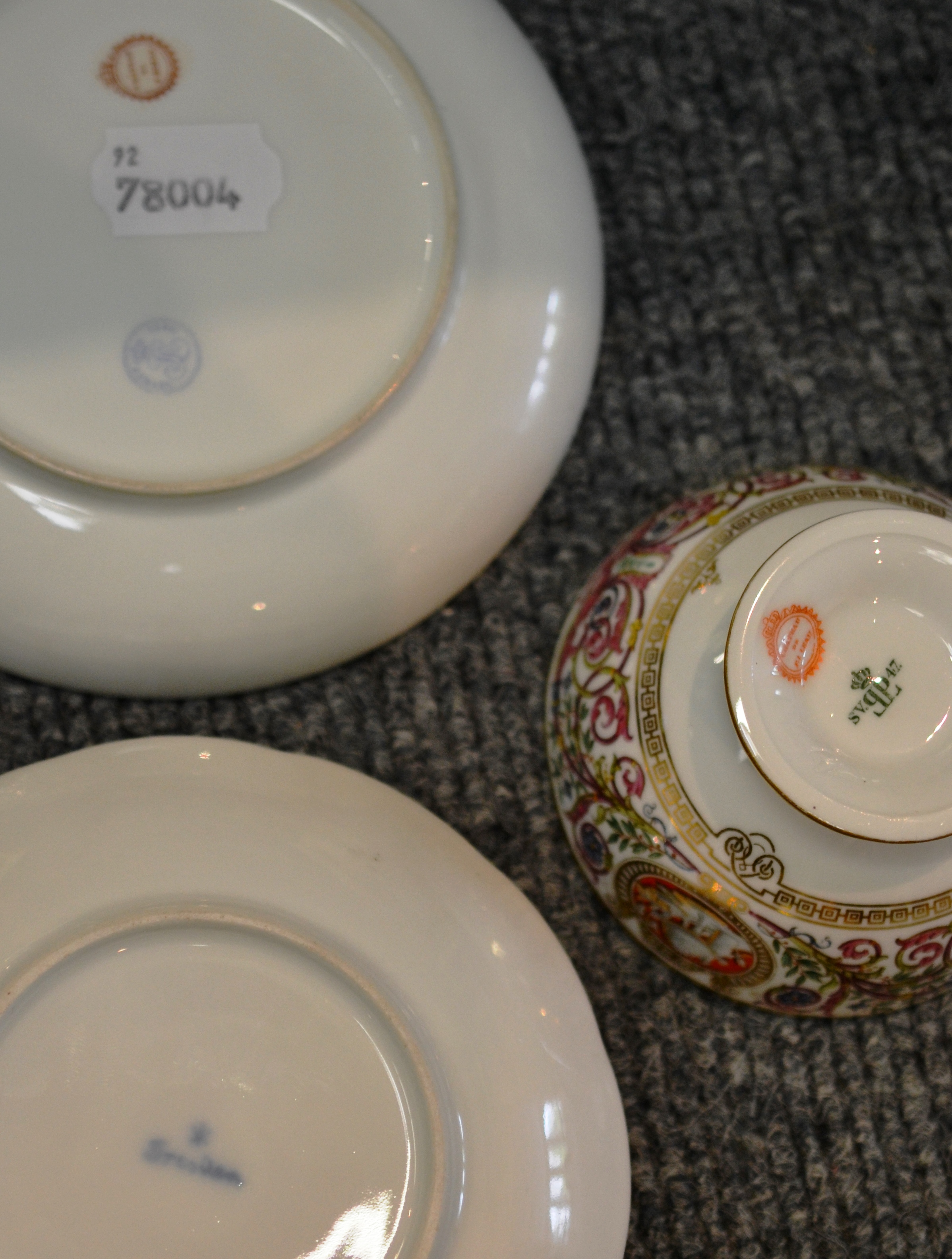 * A Meissen style twin-handled chocolate cup and trembleuse saucer painted with figures in - Image 6 of 6