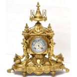 An ormolu striking mantel clock, circa 1890, the elaborate case with floral and figural mounts,