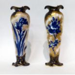 * A matched pair of Doulton Burslem Flow Blue slender baluster vases, 28cm