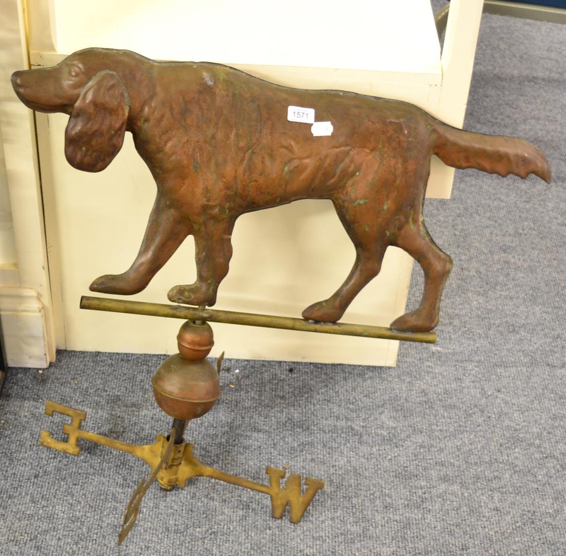 A weather vane in the form of a hunting dog