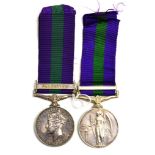 Two General Service Medals 1918-62, one with clasp PALESTINE, awarded to 14432254 SJT.G.C.RIMMER.