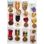 A Collection of Fourteen Medals, including US Purple Heart, UN Korea Medal, French Croix de Guerre